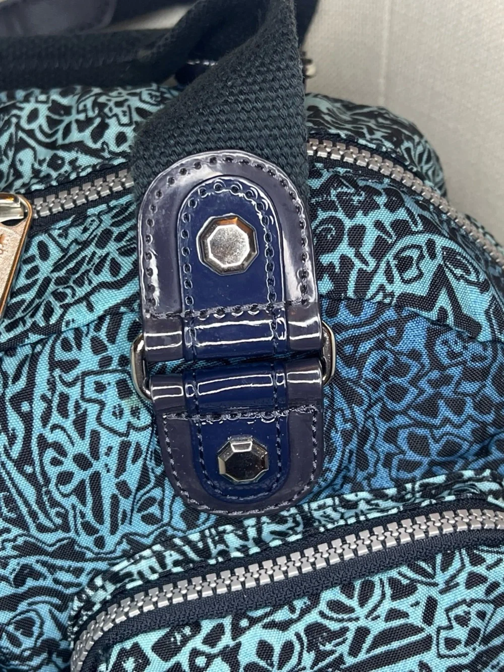 Teal and Black Patterned Shoulder Bag with Multiple Pockets
